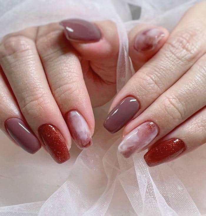mẫu nail vân đá đỏ